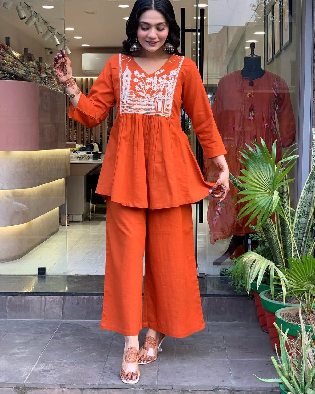 Women Attractive Embroidred Cotton Orange Kurta With Pant